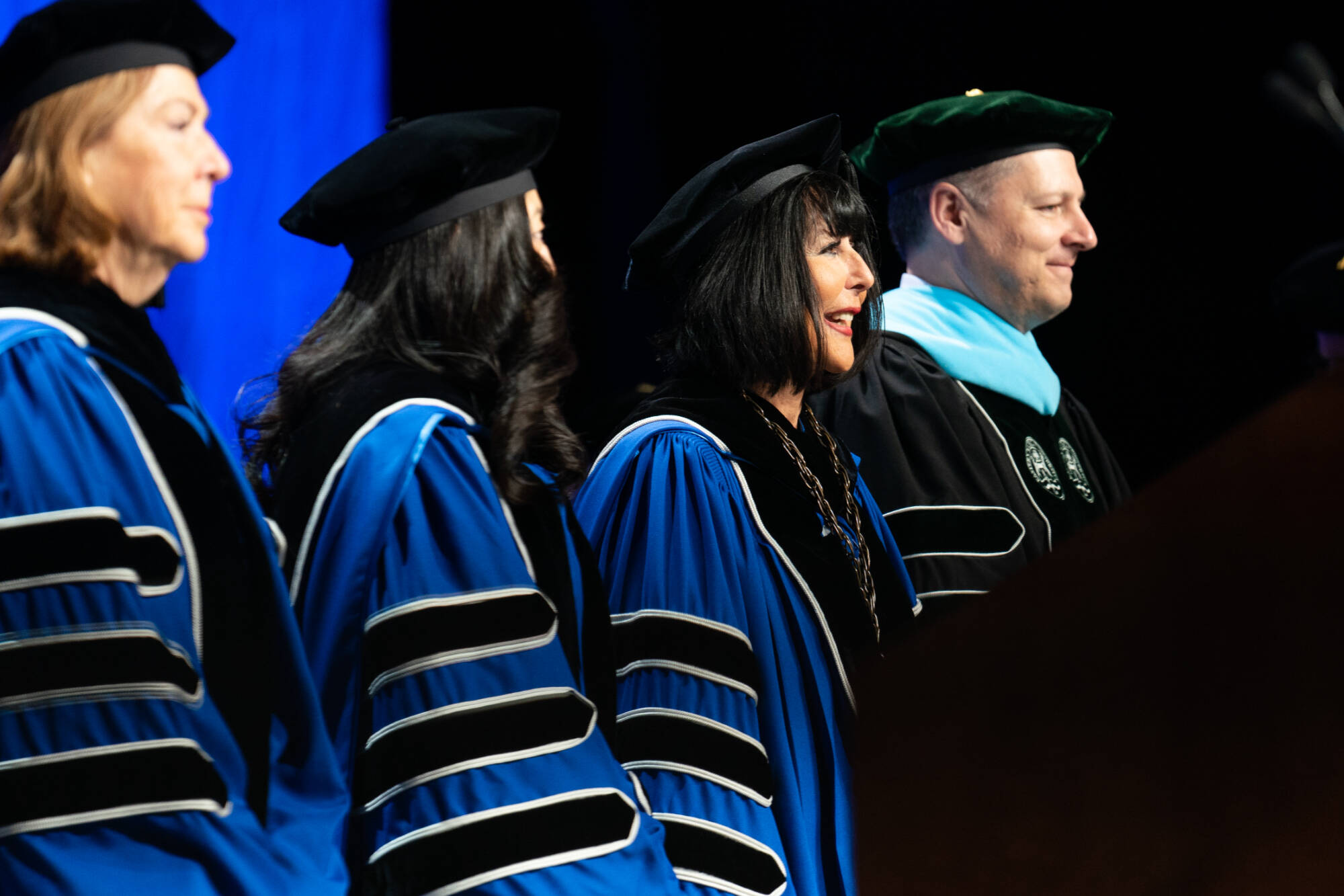 President Mantella and other leaders during a Grand Valley Commencement ceremony.